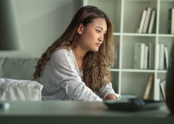 woman completing form